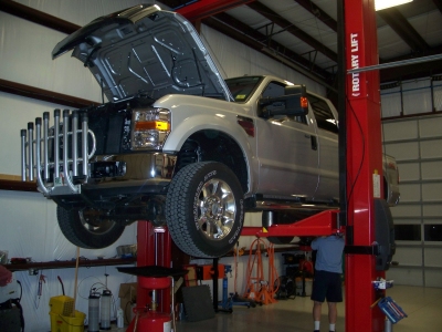 Currituck car auto truck SUV repair service oil change inspection Maintenance brakes muffler Computerized Alignment diagnostics check engine light shocks ac freon air conditioning cooling fuel injection timing belt battery